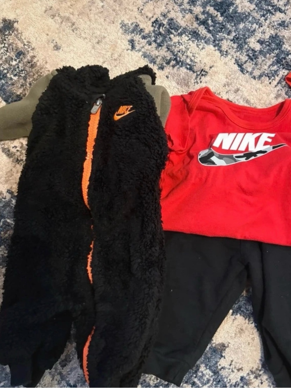 Nike Kids Black One-Piece Fleece Bodysuit with Orange Trim